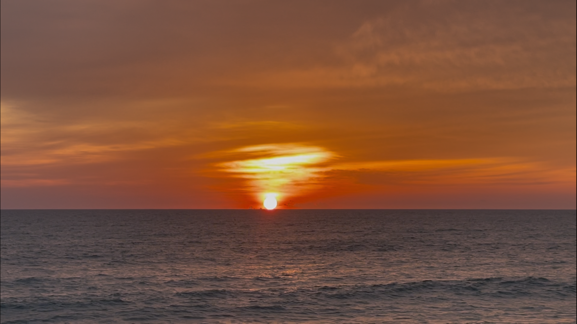 As the sun kisses the horizon, the Andaman Sea turns into a golden dream. Mai Khao sunsets never fail to mesmerize.