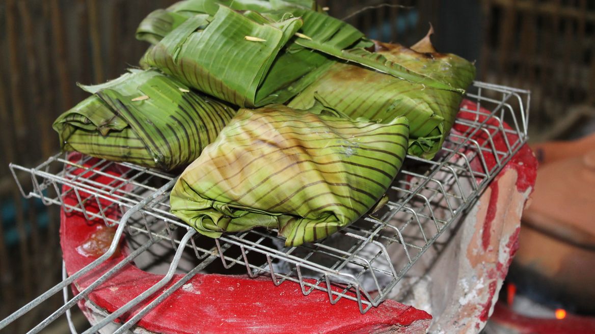 Grill fish in banana leaf