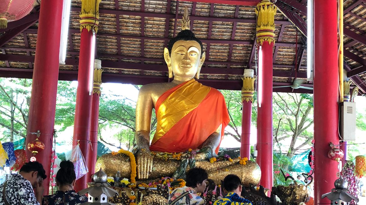 visiting the old Buddhist temple called “Wat Sapan” you have a chance to make a merit 