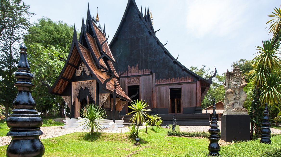 The Black House Museum is a complex of 40 buildings, most made of dark teak wood.