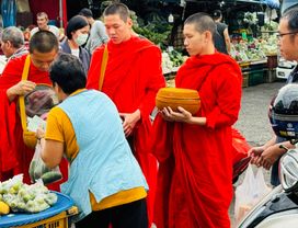 Walk with Monks Collecting Alms