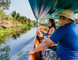 Boat Along Local Canal & Visit Farmers' Community
