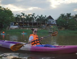 Explore Kayaking Through Mae Ping River on Sunset