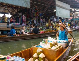 Travel from Bangkok and See the Damnoen Saduak Floating Market + Train Market 
