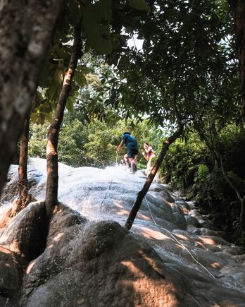 Grab the robes and climb on Bua Tong Waterfalls