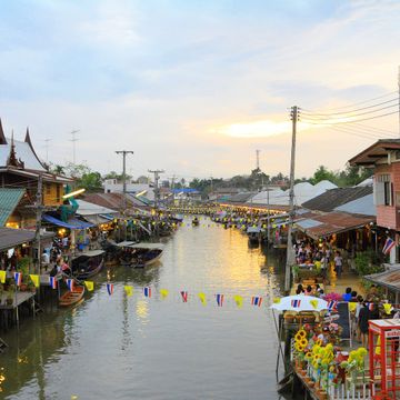 Take A Trip to Maeklong Railway Market and Boating in Amphawa Floating Market 