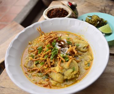 Evening Street Food Walking Tour at Chiang Mai Gate