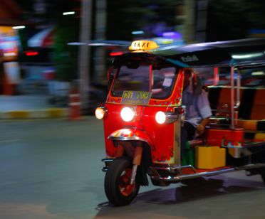 Bangkok by Night: Temples, Tuk-Tuks & Eat Like a Local with a Local Expert by EV Tuk-Tuk