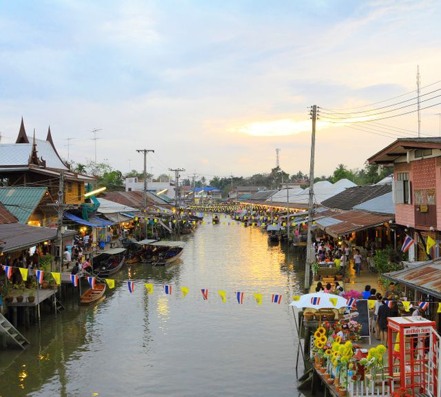 Take A Trip to Maeklong Railway Market and Boating in Amphawa Floating Market 